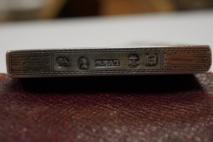 Assorted small silver including an Edwardian inset Scottish hardstone pill box, William Henry Johnson, Birmingham, 1902, 36mm, a mounted prayer book, a card case, cased comb and a plated snuff box. Condition - poor to fa